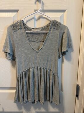 Rewind V-Neck Peplum Tunic in Sage Green with Lace Shoulders